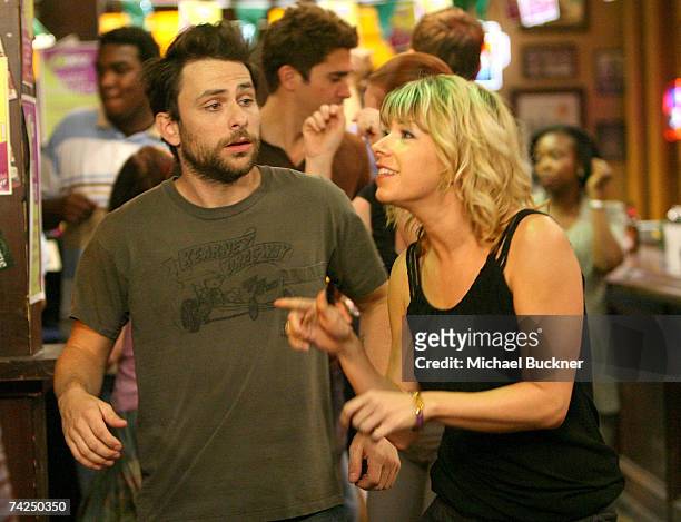 Actor Charlie Day and actress Mary Elizabeth Ellis act during a dance scene on the set of "It's Always Sunny In Philadelphia" on May 23, 2007 in Los...