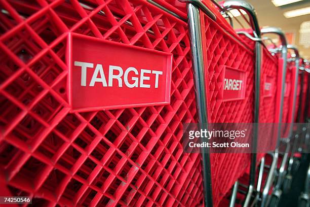 Shopping carts sit inside a Target store on May 23, 2007 in Chicago, Illinois. Today, Target Corp. Reported an 18 per cent increase in their...