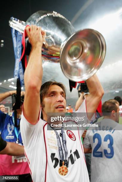 Andrea Pirlo of Milan celebrates with the trophy following his teams 2-1 victory during the UEFA Champions League Final match between Liverpool and...