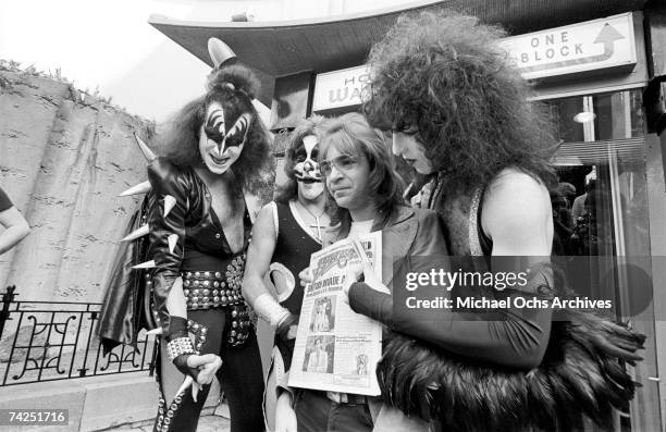 Gene Simmons, Ace Frehley, Paul Stanley and Peter Criss of the rock and roll band "Kiss" joke around with fans and cause mayhem at Grauman's Chinese...