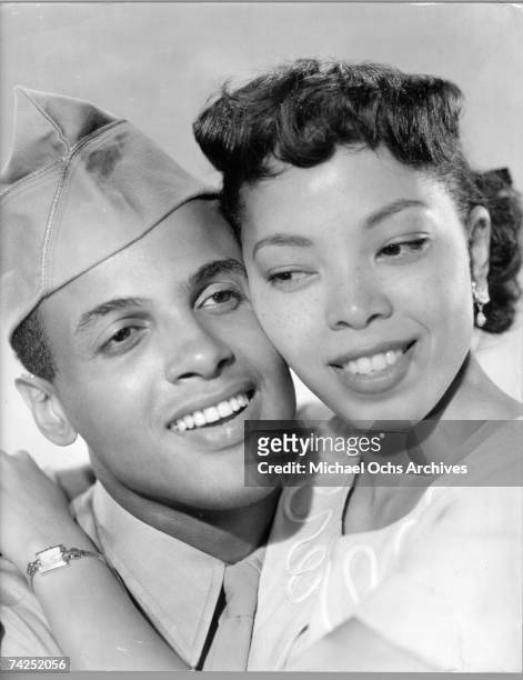 American singers and actors, Harry Belafonte and Olga James in a promotional portrait for "Carmen Jones", directed by Otto Preminger, 1954.
