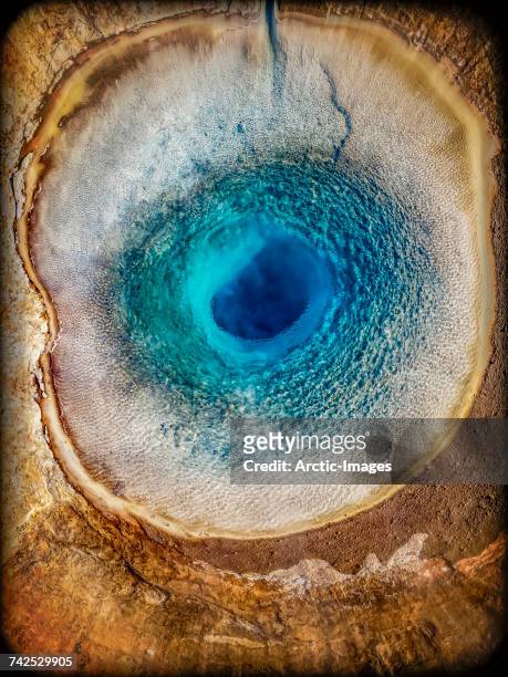 top view of strokkur geyser prior to erupting, iceland. this image is shot with a drone.  - geiser stockfoto's en -beelden