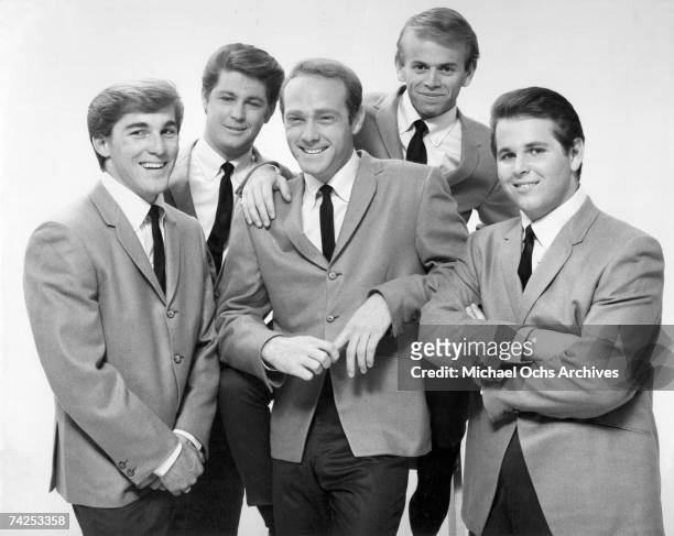 Rock and roll band "The Beach Boys" pose for a portrait in 1964. Dennis Wilson, Brian Wilson, Mike Love, Al Jardine, Carl Wilson.