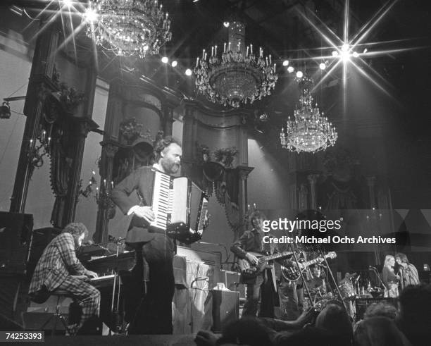 Richard Manuel, Garth Hudson, Rick Danko, Robbie Robertson and Joni Mitchell and Neil Young perform onstage for the rock and roll group 'The Band's'...