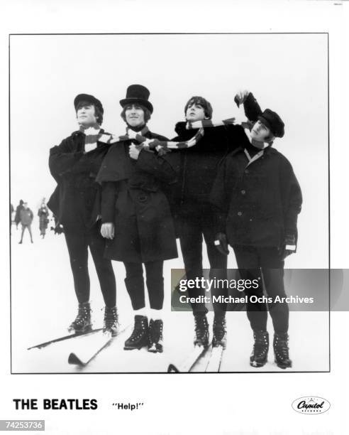 The Beatles John Lennon, Paul McCartney, Ringo Starr and George Harrison pose for a photo in the snow in March 1965 in Obertauern, Austria during a...