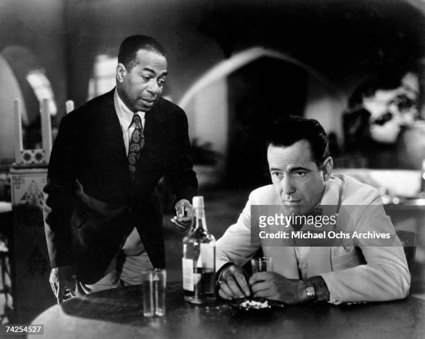 Movie still of Humphrey Bogart and Dooley Wilson on the set of the Warner Bros classic film 'Casablanca' in 1942 in Los Angeles, California.