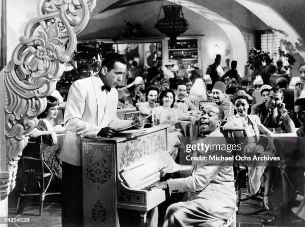 Movie still of Humphrey Bogart and Dooley Wilson on the set of the Warner Bros classic film 'Casablanca' in 1942 in Los Angeles, California.