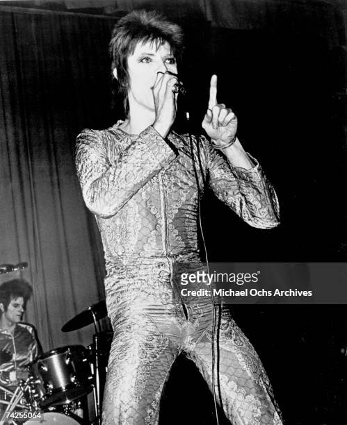 Musician David Bowie performs onstage in circa 1973.
