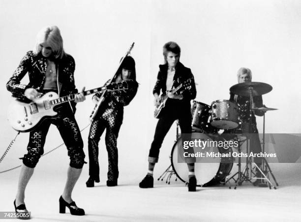 Guitarist Mick Ronson, bassist Trevor Bolder, David Bowie and drummer Mick Woodmansey of "Ziggy Stardust And The Spiders From Mars" pose for a...
