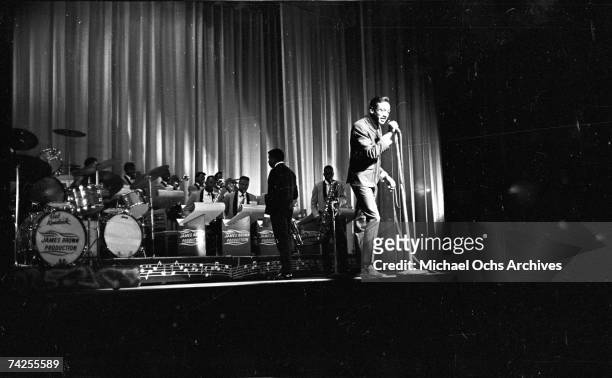 Member of the Famous Flames and Soul singer James Brown's band Bobby Byrd performs onstage at the Apollo Theatre in New York, New York.