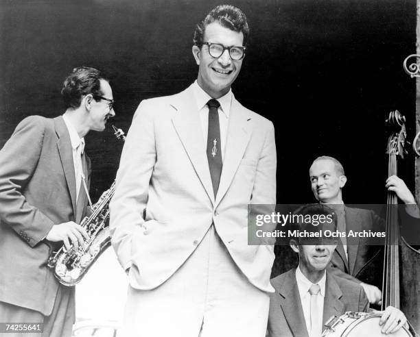 Jazz pianist Dave Brubeck poses for a portrait with the Dave Brubeck Quartet which included Paul Desmond on saxophone, Lloyd Davis on drums and Ron...