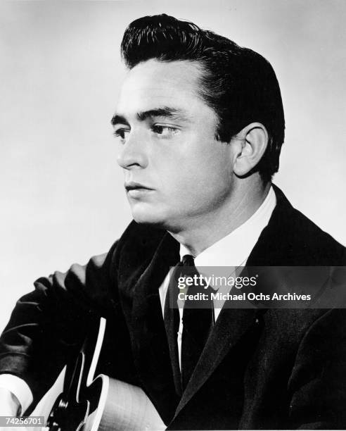 Country singer/songwriter Johnny Cash poses for a portrait in circa 1957.