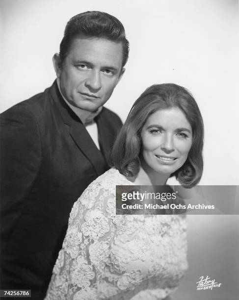 Country singers Johnny Cash and June Carter pose for a portrait in circa 1968.