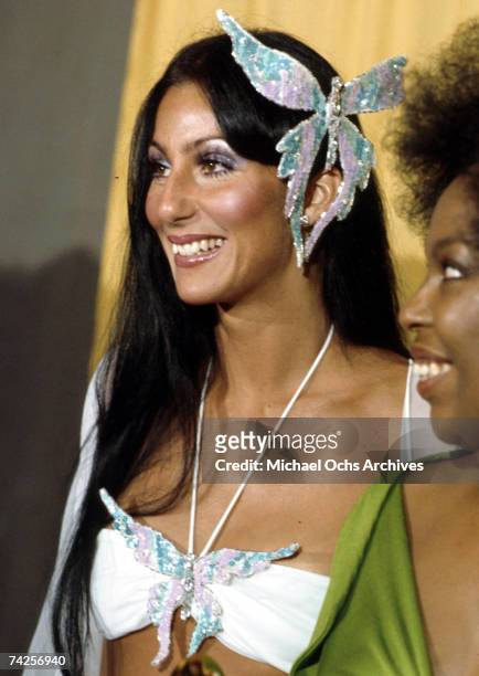 Entertainer Cher attends the Grammy awards wearing a large butterfly pin in her hair on March 2, 1974 in Los Angeles, California.