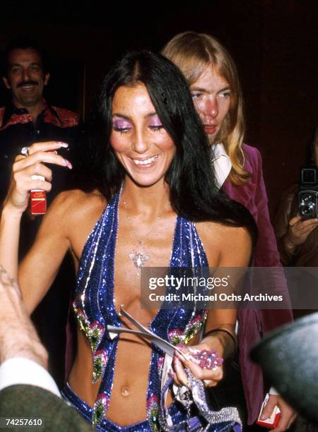 Entertainer Cher and guitarist Gregg Allman attend an event in 1977.