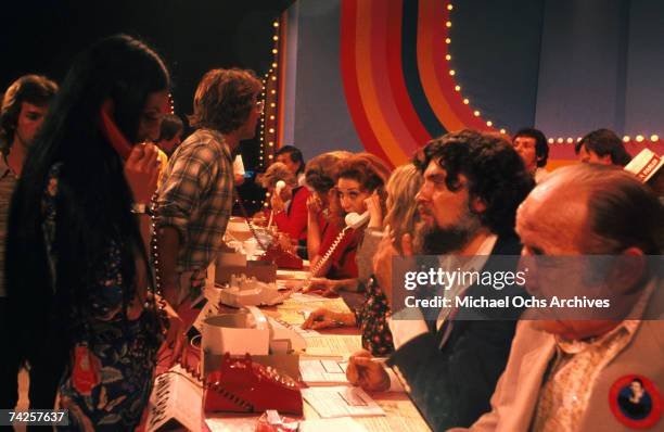 Entertainer Cher takes calls at a charity telethon in circa 1968.