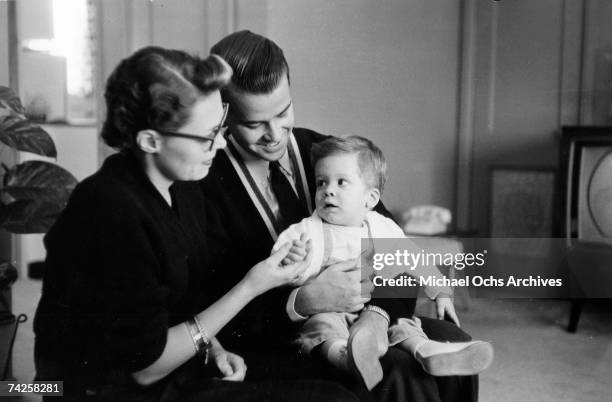 Host of the television show "American Bandstand" Dick Clark poses for a portrait with his wife Barbara Clark and their son Richard Clark, Jr. On May...