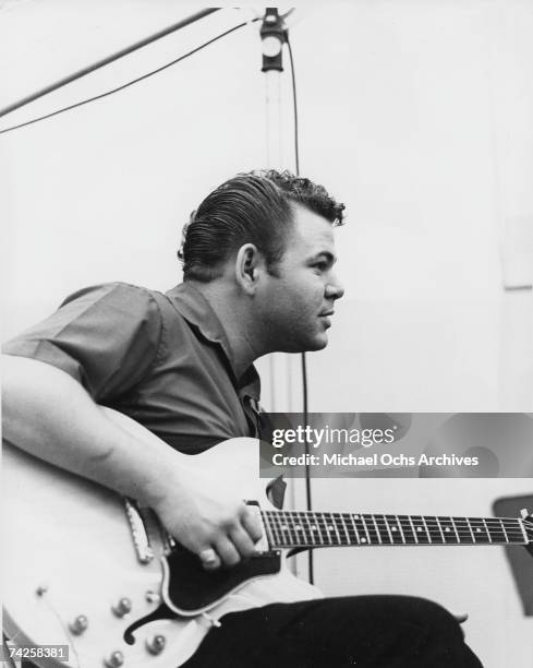 Country artist Roy Clark in the Capitol Records recording studio circa 1962.