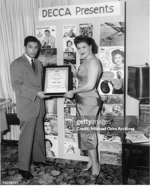 Photo of Patsy Cline Photo by Michael Ochs Archives/Getty Images