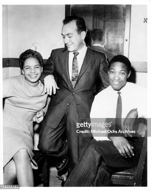 Soul singer Sam Cooke with DJ Alan Freed and Zola Taylor of The Platters pose for a portrait circa 1958.