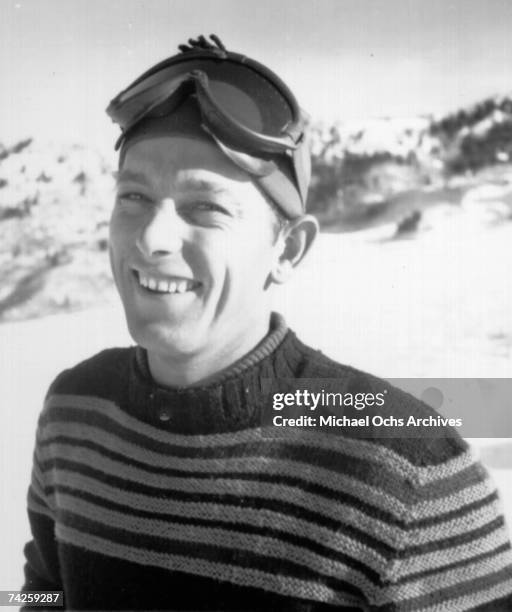 Actor Gary Cooper poses for a portrait session on a ski trip in circa 1952 in Aspen, Colorado.