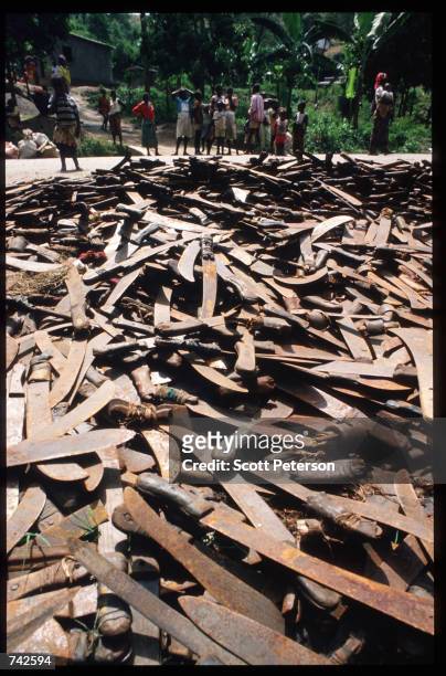 Machetes are discarded that were used to kill Tutsis May 25, 1994 in Rwanda. Following the assassination of President Juvenal Habyarimana in April,...