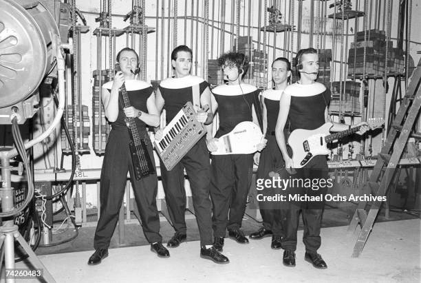 Gerald Casale, Bob Casale, Mark Mothersbaugh, Alan Myers and Bob Mothersbaugh of the new wave punk music group "Devo" pose for a portrait on...