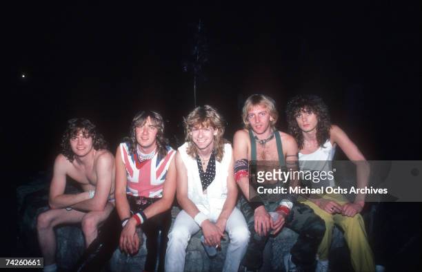Rock band Def Leppard poses for a portrait backstage in 1983.