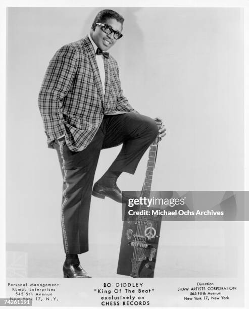 Bo Diddley poses for a portrait with his trademark square Gretsch electric guitar in circa 1957 in New York City, New York.