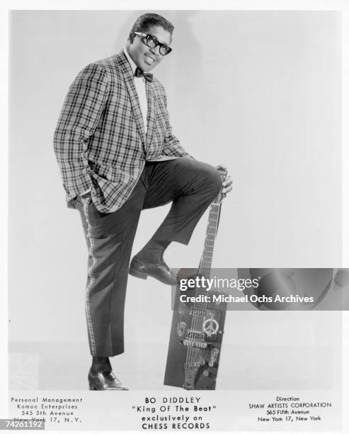 Bo Diddley poses for a portrait with his trademark square Gretsch electric guitar in circa 1957 in New York City, New York.