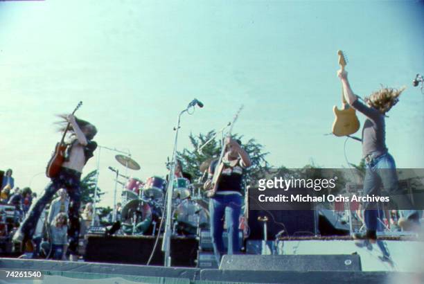 Rock and roll band "The Doobie Brothers" perform onstage in circa 1974.
