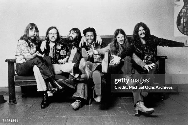 Jeff "Skunk" Baxter, John Hartman, Keith Knudsen, Tiran Porter, Patrick Simmons, Tom Johnston of the rock and roll band "The Doobie Brothers" pose...