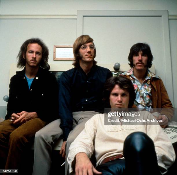 The Doors L-R Robby Krieger, Ray Manzarek, Jim Morrison an John Densmore pose for a portrait circa 1968.