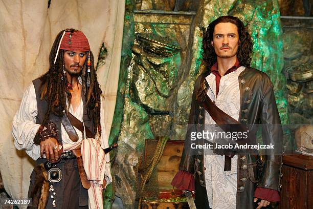 Wax figure of Orlando Bloom dressed as the character "Will Turner" and Johnny Depp as the character "Captain Jack Sparrow" from the Pirates of the...