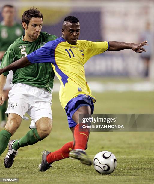 East Rutherford, UNITED STATES: Christian Benitez of Ecuador controls ball against Alan Bennett of Ireland during a friendly match 23 May 2007 at...