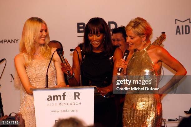 Sharon Stone with Claudia Schiffer and Naomi Campbell attend the Amfar Auction during the Amfar dinner against Aids,on May 23 2007 in Mougins France.