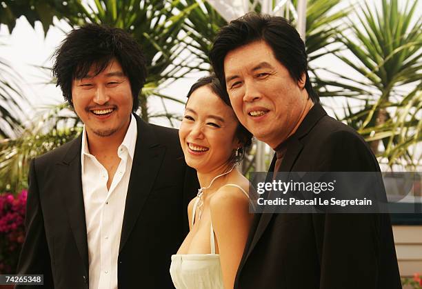 Actor Kang-ho Song, actress Do-yeon Jeon and director Chang-dong Lee attend a photocall to promote the film 'Secret Sunshine' at the Palais des...