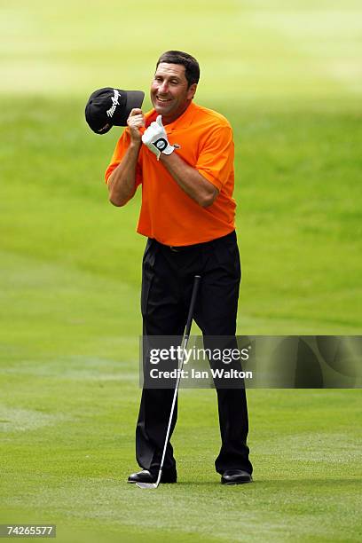 Jose-Maria Olazabal of Spain reacts to a lucky shot on the 13th hole during the First Round of the BMW Championship at The Wentworth Club on May 24,...