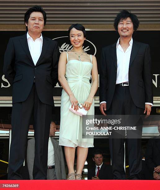 South Korean director Lee Chang-Dong and actors Do-Yeon Jeon and Kang-Ho Song pose 24 May 2007 prior to attend the screening of their film 'Secret...