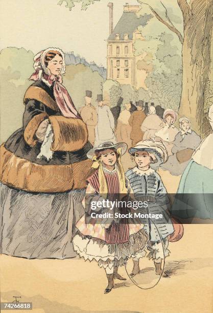 Fashion plate by French artist Francois Courboin entitled 'Children in the Tuileries Gardens' depicts two children, one with a rolling hoop,...