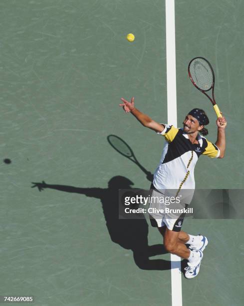 Goran Ivanisevic of Croatia serves to Cristiano Caratti during their Men's Singles second round match at the US Open Tennis Championship on 1...