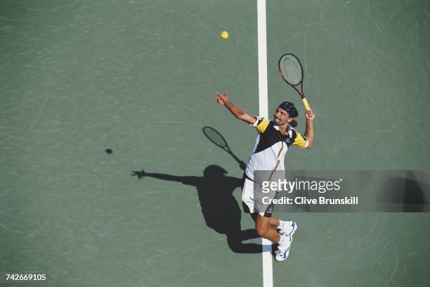 Goran Ivanisevic of Croatia serves to Cristiano Caratti during their Men's Singles second round match at the US Open Tennis Championship on 1...