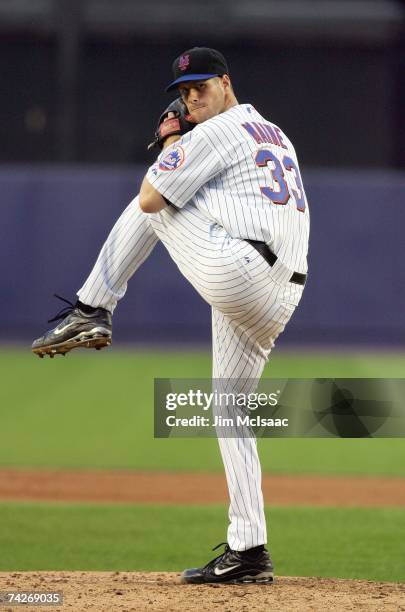 John Maine of the New York Mets delivers the pitch during the game against the Chicago Cubs on May 15, 2007 at Shea Stadium in the Flushing...