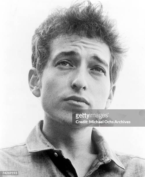 Bob Dylan poses for a portrait to promote the release of his album "The Times They Are A-Changin'" in January 1964.