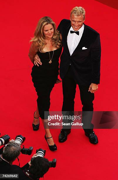 Actor Dolph Lundgren and wife Anette Qviberg attend the premiere for the film 'Ocean's Thirteen' at the Palais des Festivals during the 60th...