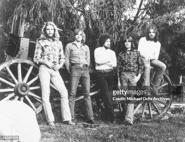 Don Felder, Joe Walsh, Don Henley, Randy Meisner, and Glenn Frey of the rock band "Eagles" pose for a portrait in circa 1977.