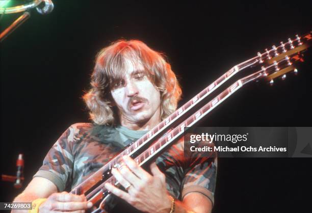 Musician Joe Walsh of the rock band 'Eagles' performs onstage in circa 1976 in Los Angeles.