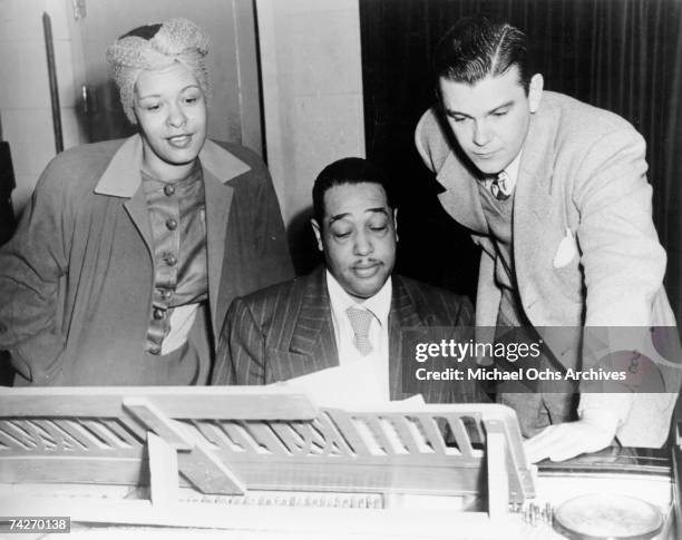 Jazz singer Billie Holiday and composer Duke Ellington rehearse "Symphony in Black: A Rhapsody of Negro Life" in 1935.