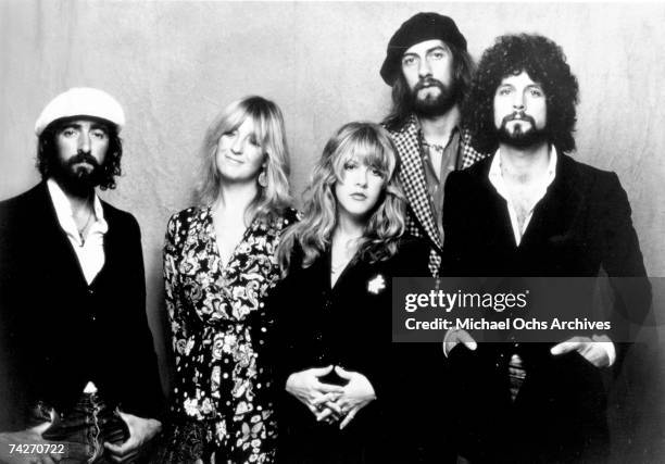 John McVie, Christine McVie, Stevie Nicks, Mick Fleetwood, and Lindsey Buckingham of the rock group "Fleetwood Mac" pose for a portrait in 1975.