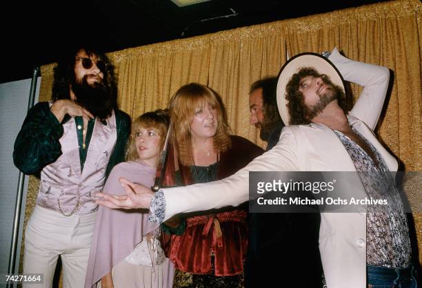 Fleetwood Mac pose for photographers backstage at the 5th American music Awards held at the Santa Monica Civic Auditorium on January 16, 1978 in...